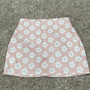 A pink floral skirt
